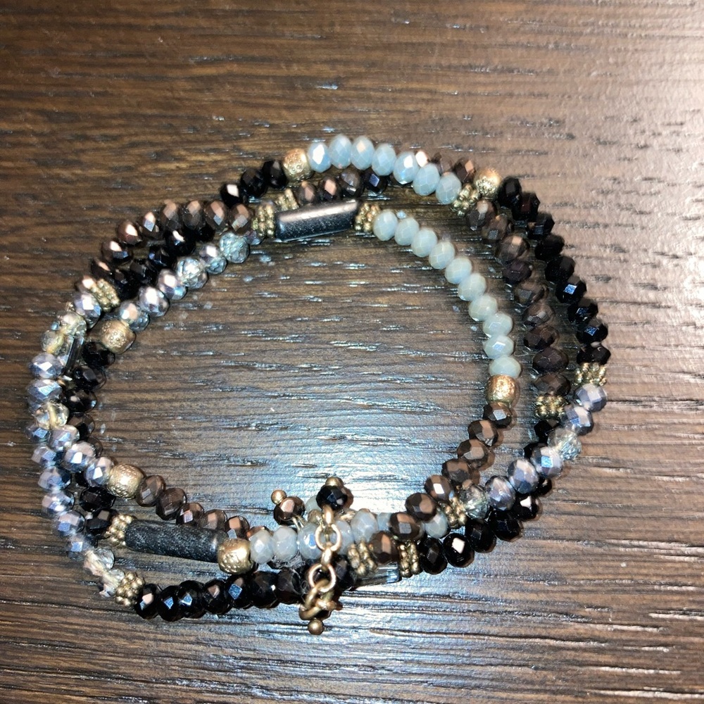 Brand new triple bracelet with no tags. Beautiful and very light weight